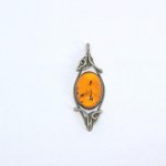 Silver pendant with natural amber