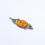 Silver pendant with natural amber