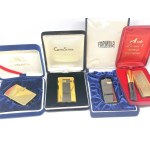 Set of 4 lighters in boxes