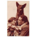A couple in love and a dog
