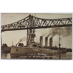 [NAVAL HISTORY]. The S.M.S. “Kolberg” passes under the Rendsburg High Bridge. Signal....