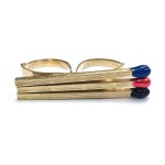 Gold-Plated Brass Knuckles "Three Matches" / Marek Piekarczyk