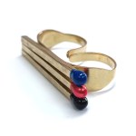 Gold-Plated Brass Knuckles "Three Matches" / Marek Piekarczyk