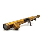 An antique brass telescope from the turn of the 19th and 20th centuries
