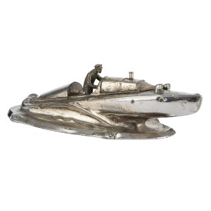 An inkwell shaped like a motorboat