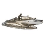 An inkwell shaped like a motorboat