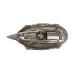 An inkwell shaped like a motorboat