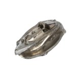 An inkwell shaped like a motorboat