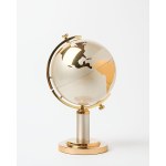 A cigarette case shaped like a globe.