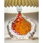 A glass lamp, artistic glass, with a base featuring a beautiful texture and color.