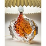 A glass lamp, artistic glass, with a base featuring a beautiful texture and color.