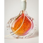 A glass lamp, artistic glass, with a base featuring a beautiful texture and color.