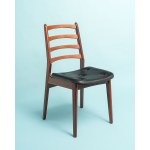 A beautiful chair made of teak wood, with a vinyl-covered seat. Germany, 1970s.