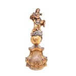 Immaculata (a late Baroque ornament on a small architectural feature)
