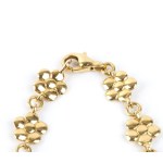 SCHREIBER MILANO 18-karat yellow gold parure, comprising a necklace, a pair of earrings and a ring, Milan, probably dating from the 1970s-1980s