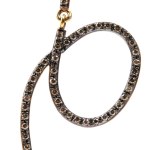 A pair of gold and diamond earrings