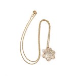 Necklace with a gold diamond pendant