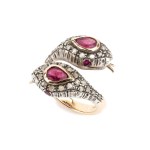 Gold and silver "snake" ring set with Burmese rubies and diamonds.