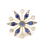 Blue sapphire diamond moonstone stylised flower motif silver and gold brooch