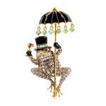 Brooch in gilded silver, gold, enamel, rubies, emeralds and diamonds