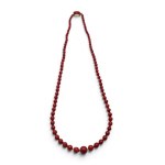 Mediterranean coral with gold necklace
