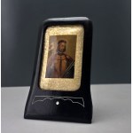 A travel icon in an old wooden Art Nouveau-style frame depicting St. Wenceslas—1930s.