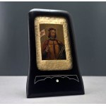 A travel icon in an old wooden Art Nouveau-style frame depicting St. Wenceslas—1930s.