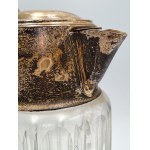 A large, silver-plated beverage jug from the first half of the 20th century—crystal glass, Art Deco period