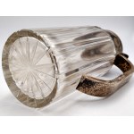 A large, silver-plated beverage jug from the first half of the 20th century—crystal glass, Art Deco period
