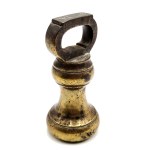 A two-pound brass bell-shaped weight - England - 19th century