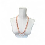 A one-of-a-kind gold necklace made of natural coral and Akoya pearls
