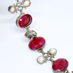 Silver bracelet with large natural rubies and pearls