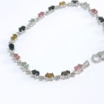Silver bracelet with multiple natural stones