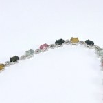Silver bracelet with multiple natural stones