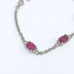 Silver bracelet with natural rubies and white sapphires