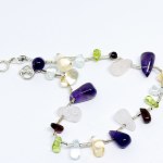 Silver bracelet with multiple natural stones