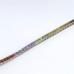 Silver bracelet with natural garnets, peridots, citrines, and amethysts