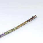 Silver bracelet with natural garnets, peridots, citrines, and amethysts