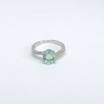 Silver ring with natural green and white sapphires
