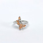 Silver ring with natural orange sapphires