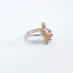 Silver ring with natural orange sapphires