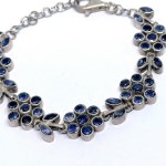Silver floral bracelet with natural tanzanites