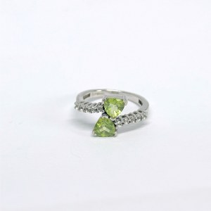 Silver ring with natural peridots and white sapphires