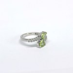 Silver ring with natural peridots and white sapphires