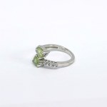 Silver ring with natural peridots and white sapphires