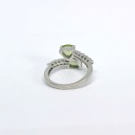 Silver ring with natural peridots and white sapphires