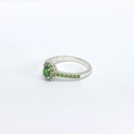 Silver ring with natural green garnets