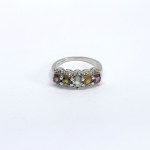 Silver ring with natural garnets, citrines, white topazes, and aquamarine