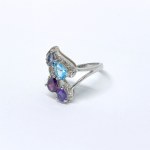 Silver ring with natural garnet, amethyst, topaz, iolite, and white topaz