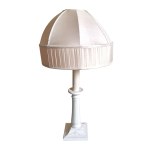 An original white lamp from the Bristol Hotel